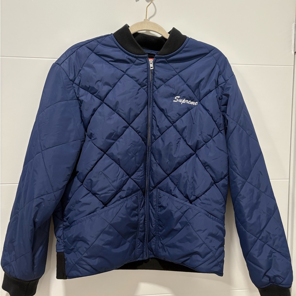 Supreme Navy Quilted Jacket with Red Truck Design